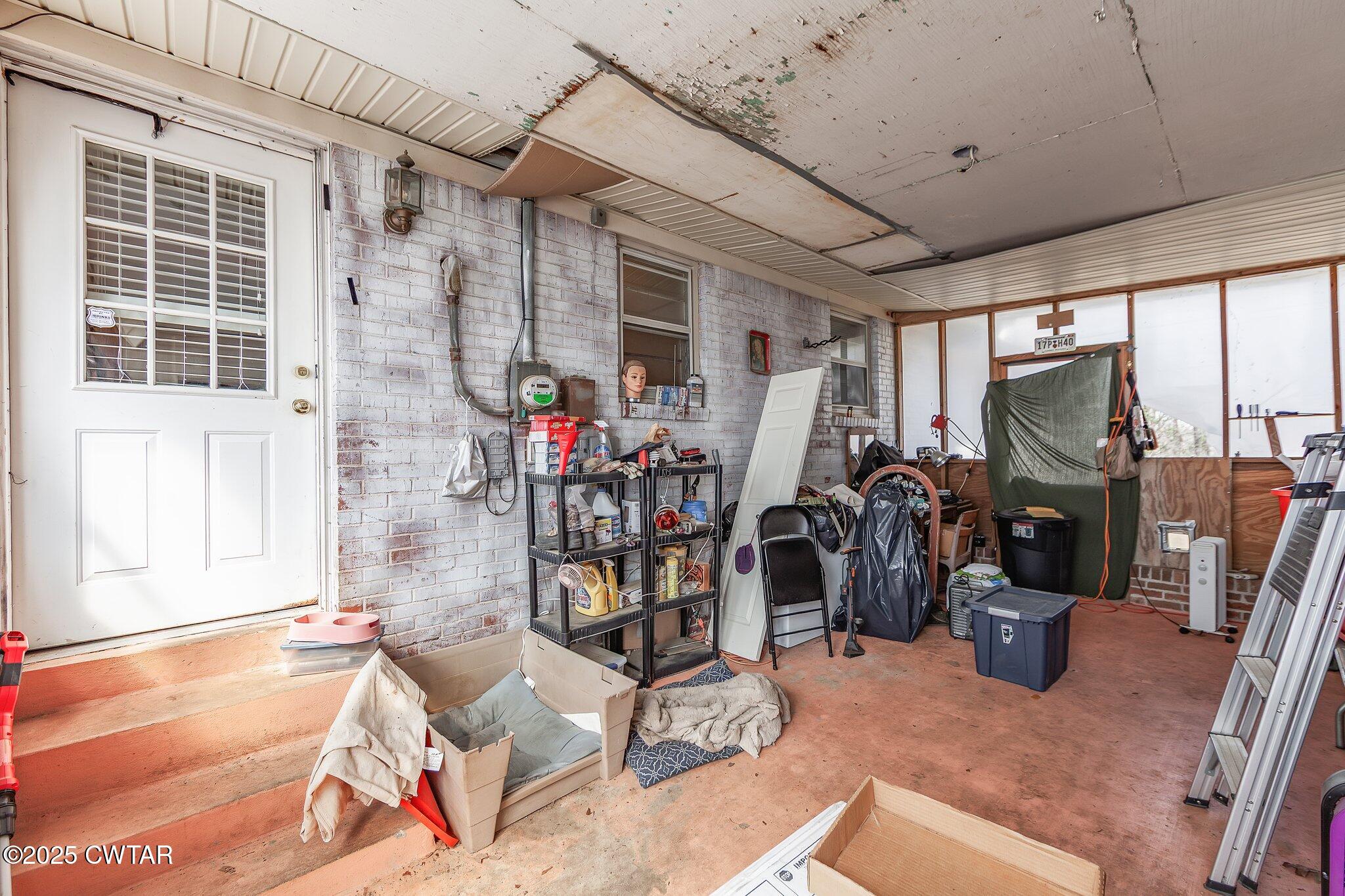 196 Pierce Road Beech Bluff, TN 38313 - Photo 27 of 63 a view of a room with gym equipment