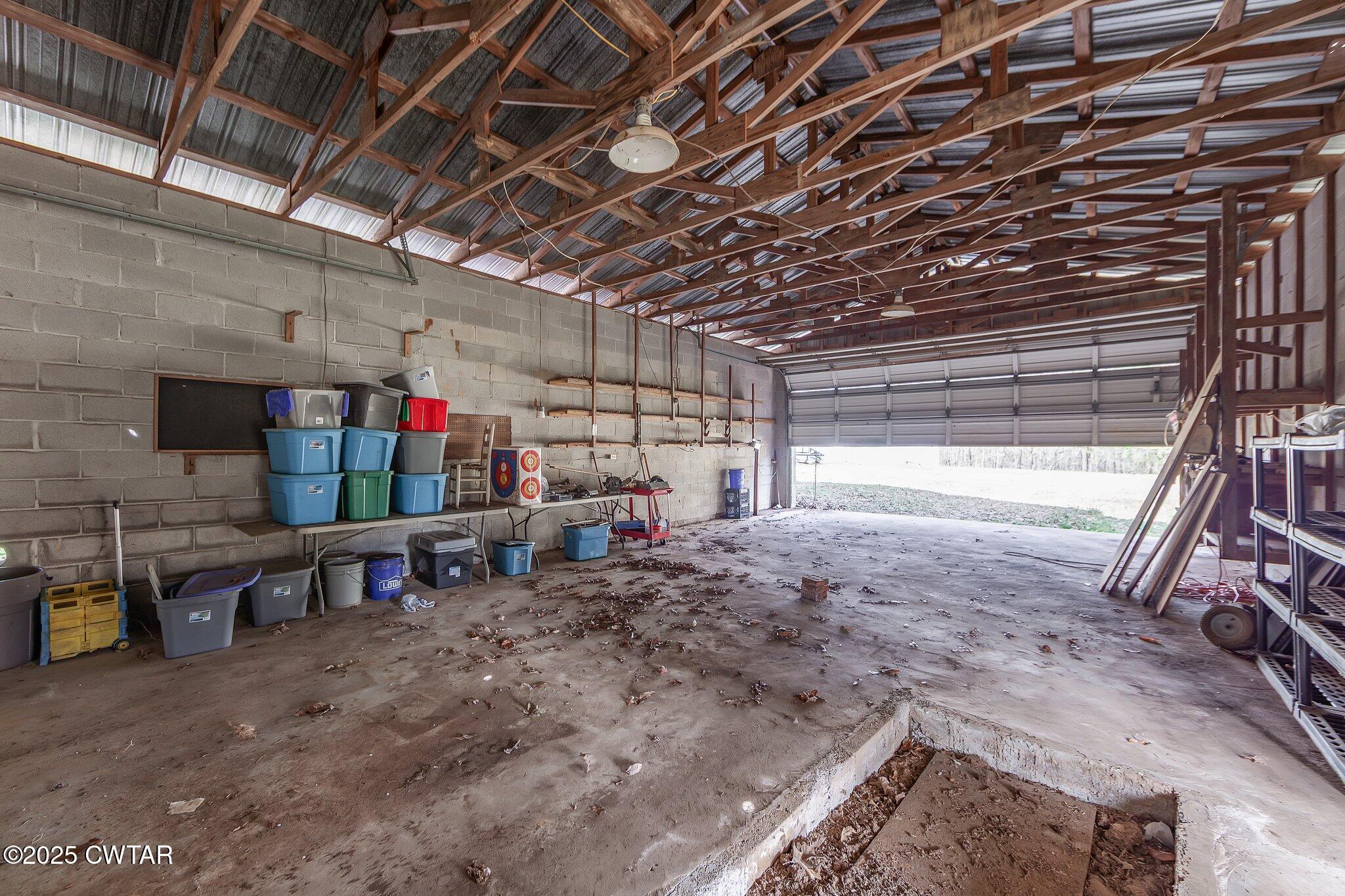 196 Pierce Road Beech Bluff, TN 38313 - Photo 28 of 63 a view of storage and utility room