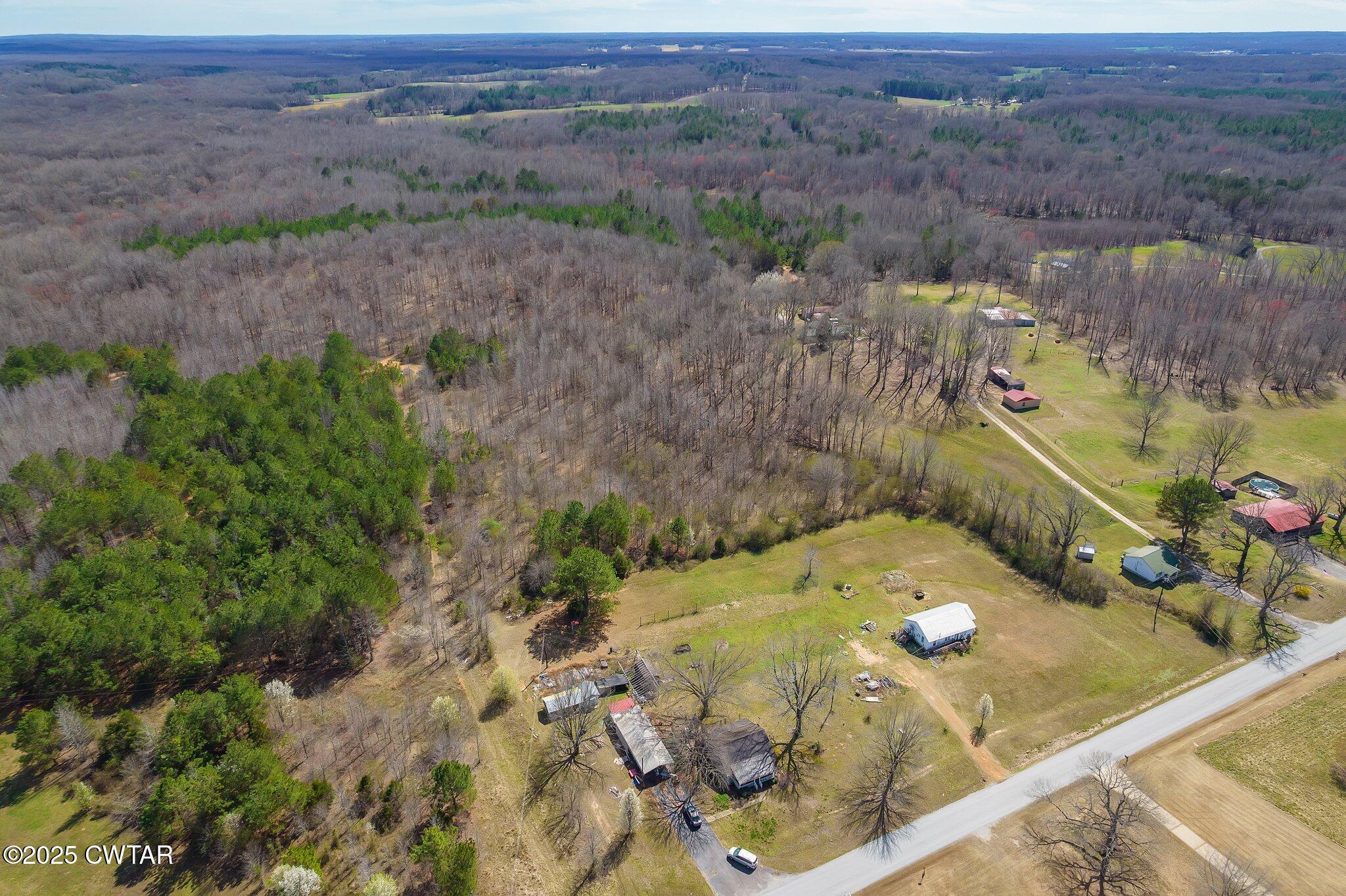196 Pierce Road Beech Bluff, TN 38313 - Photo 39 of 63 a view of a pool with a yard