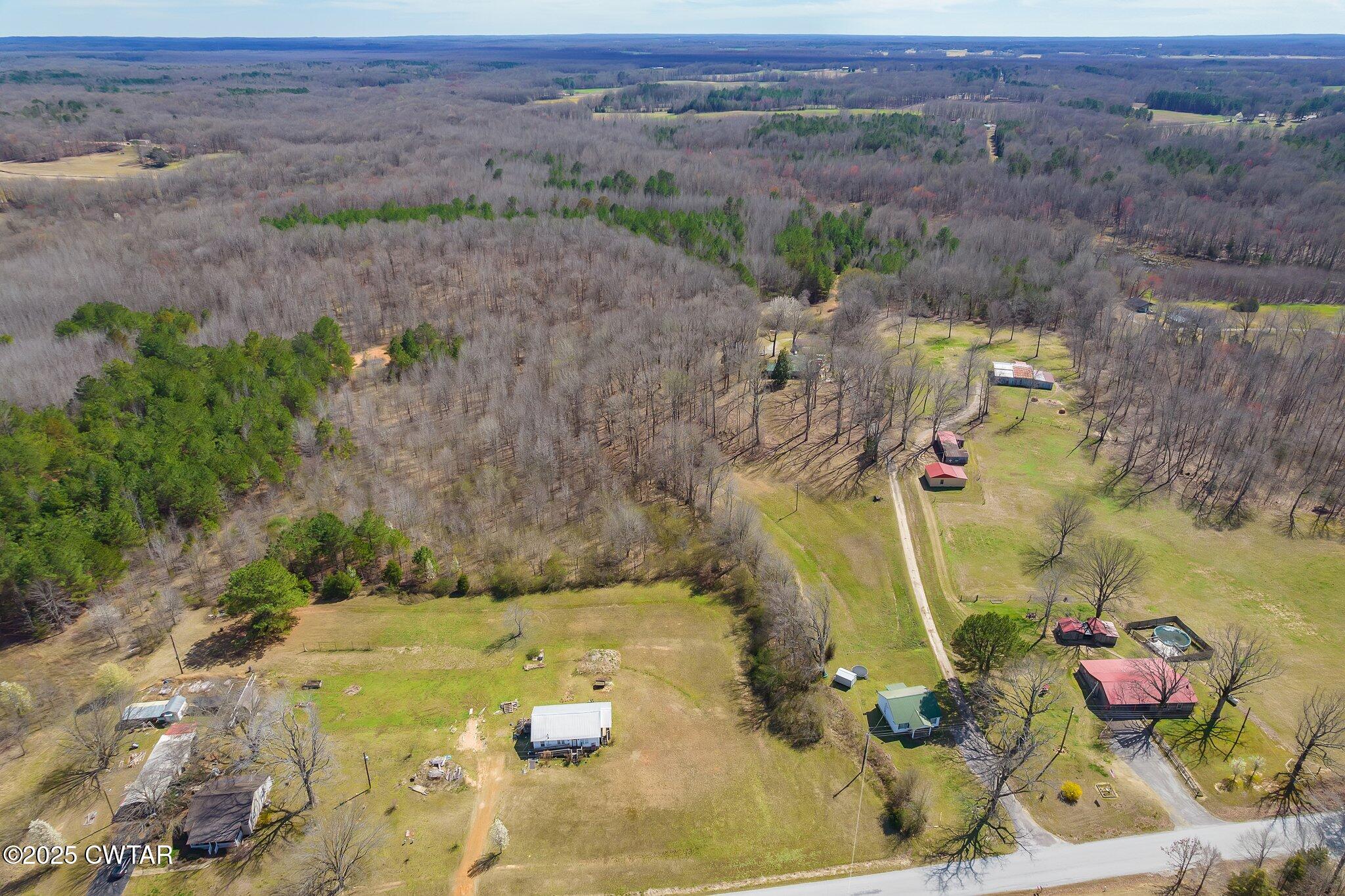 196 Pierce Road Beech Bluff, TN 38313 - Photo 40 of 63 an aerial view of a house with outdoor space