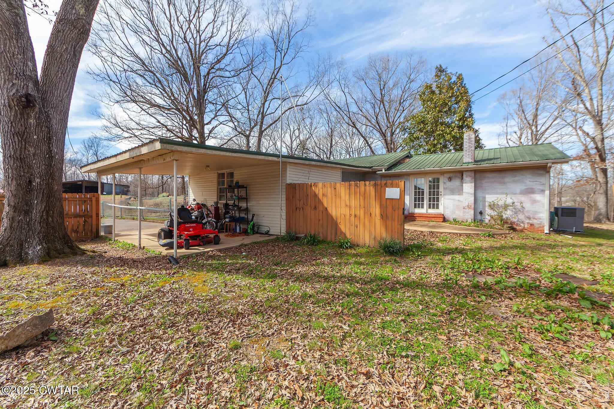 196 Pierce Road Beech Bluff, TN 38313 - Photo 46 of 63 a view of a house with a yard