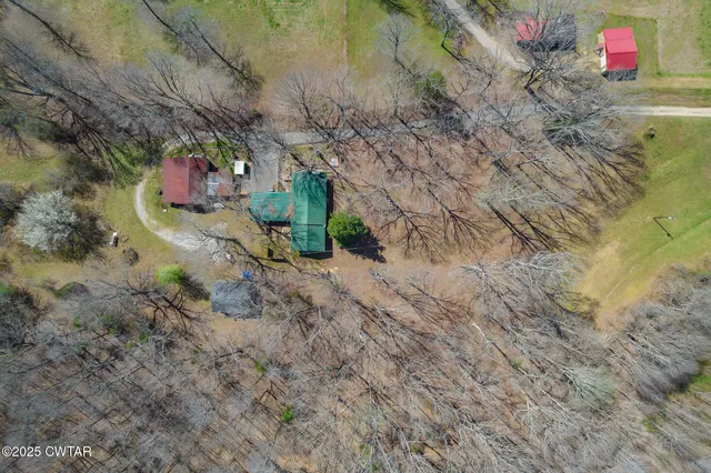 a living room filled with furniture and a table