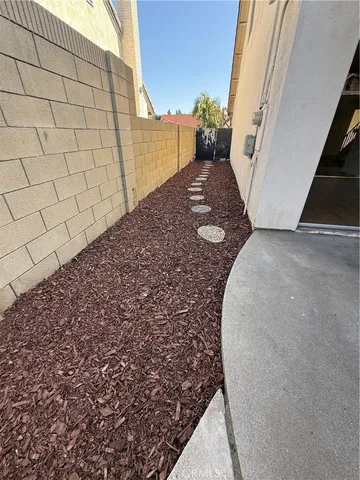 a view of swimming pool from a balcony