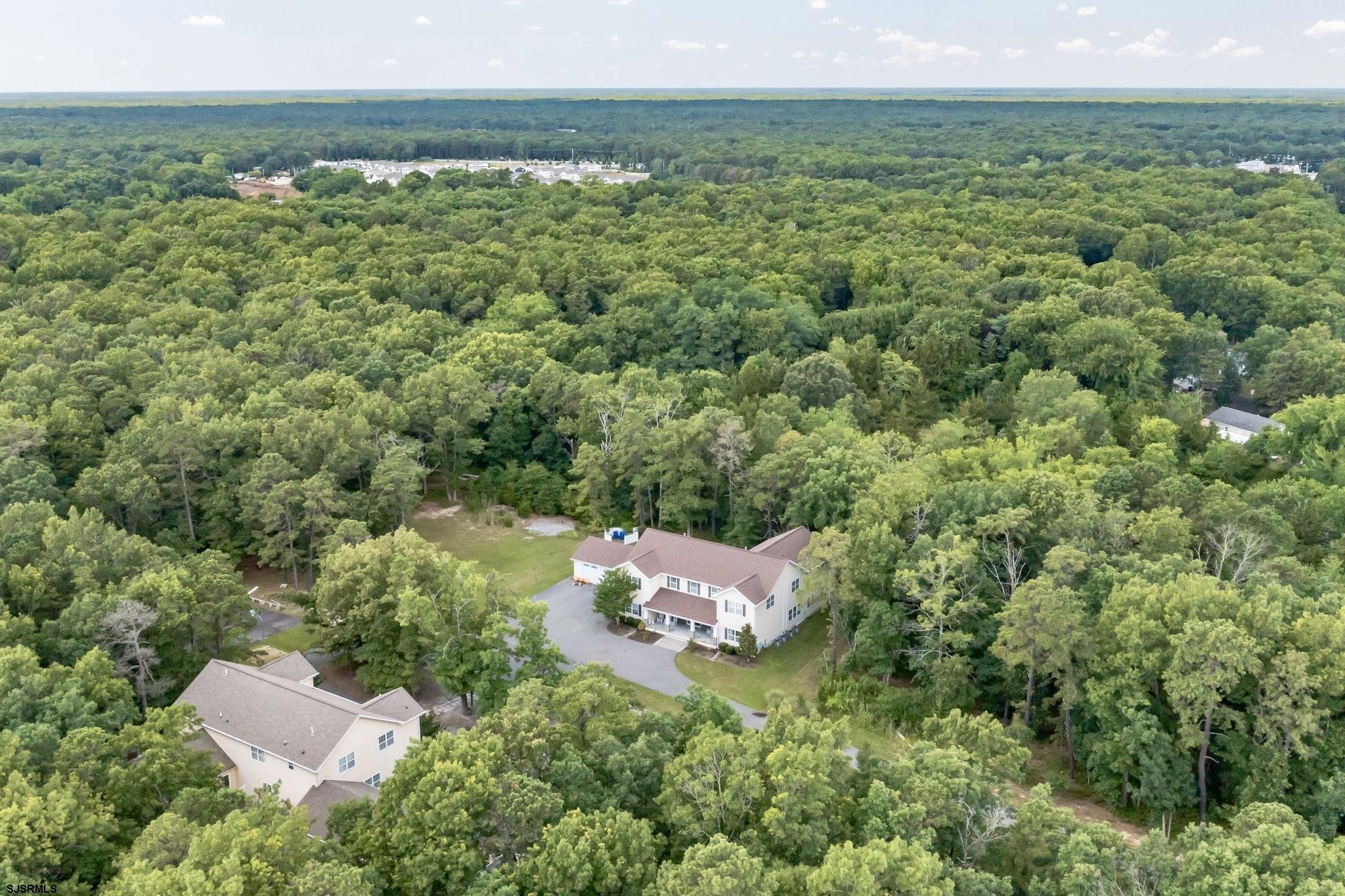 6139 Mill Road Egg Harbor Township, NJ 08234 - Photo 4 of 5 an aerial view of a house with a yard