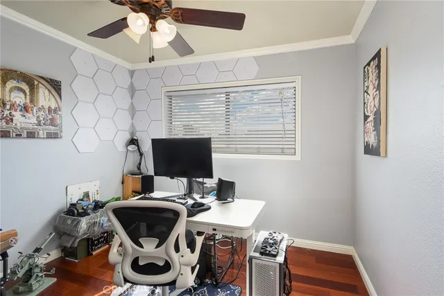 a workspace with furniture and wooden floor