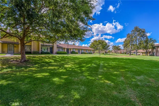 a house view with a garden space