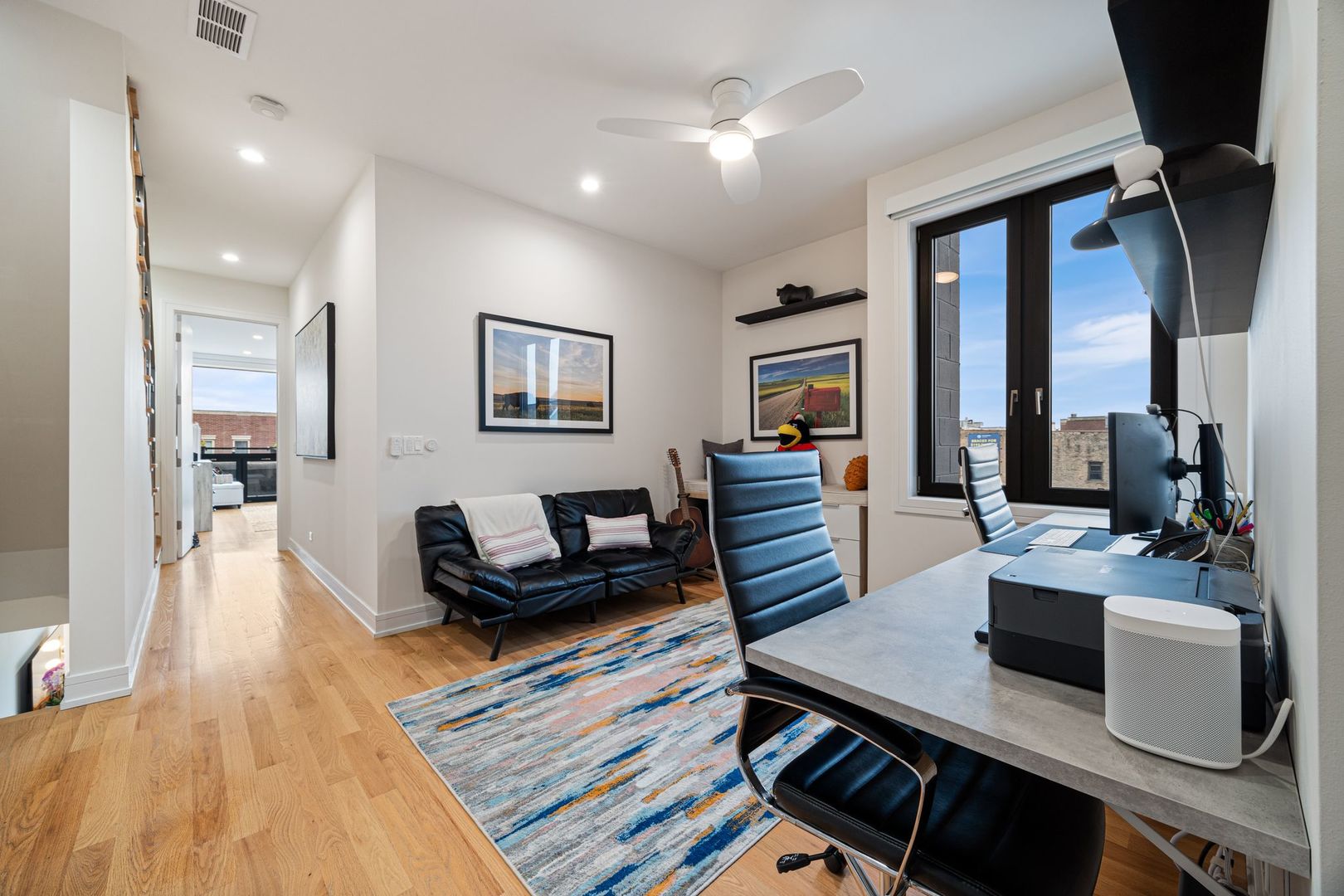 2116 West Chicago Avenue, Unit 3W Chicago, IL 60622 - Photo 15 of 37 a living room with furniture and a wooden floor