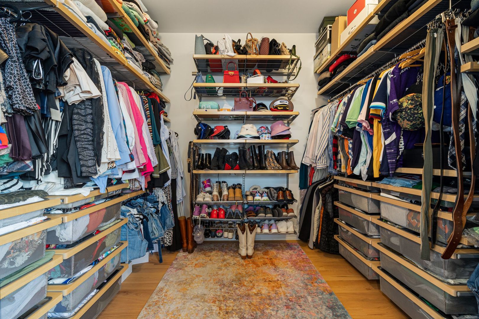 2116 West Chicago Avenue, Unit 3W Chicago, IL 60622 - Photo 22 of 37 a view of walk in closet with clothes and shoes