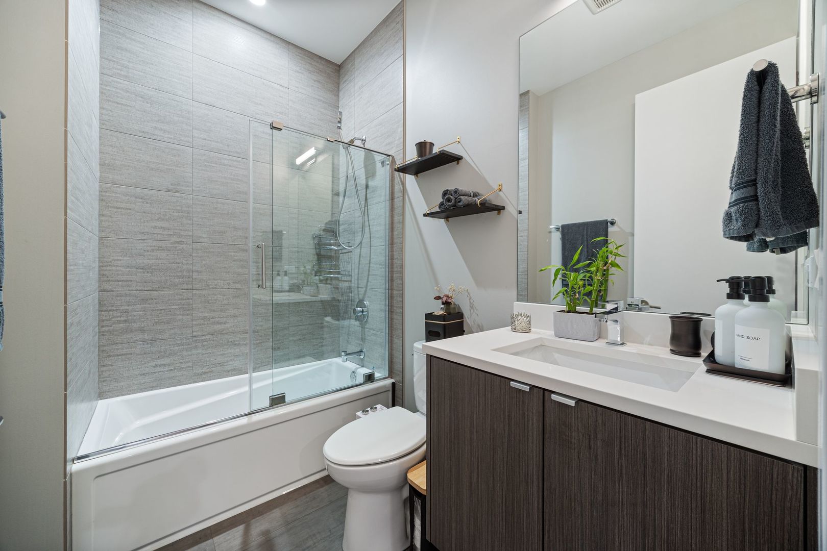 2116 West Chicago Avenue, Unit 3W Chicago, IL 60622 - Photo 29 of 37 a bathroom with a sink and a mirror