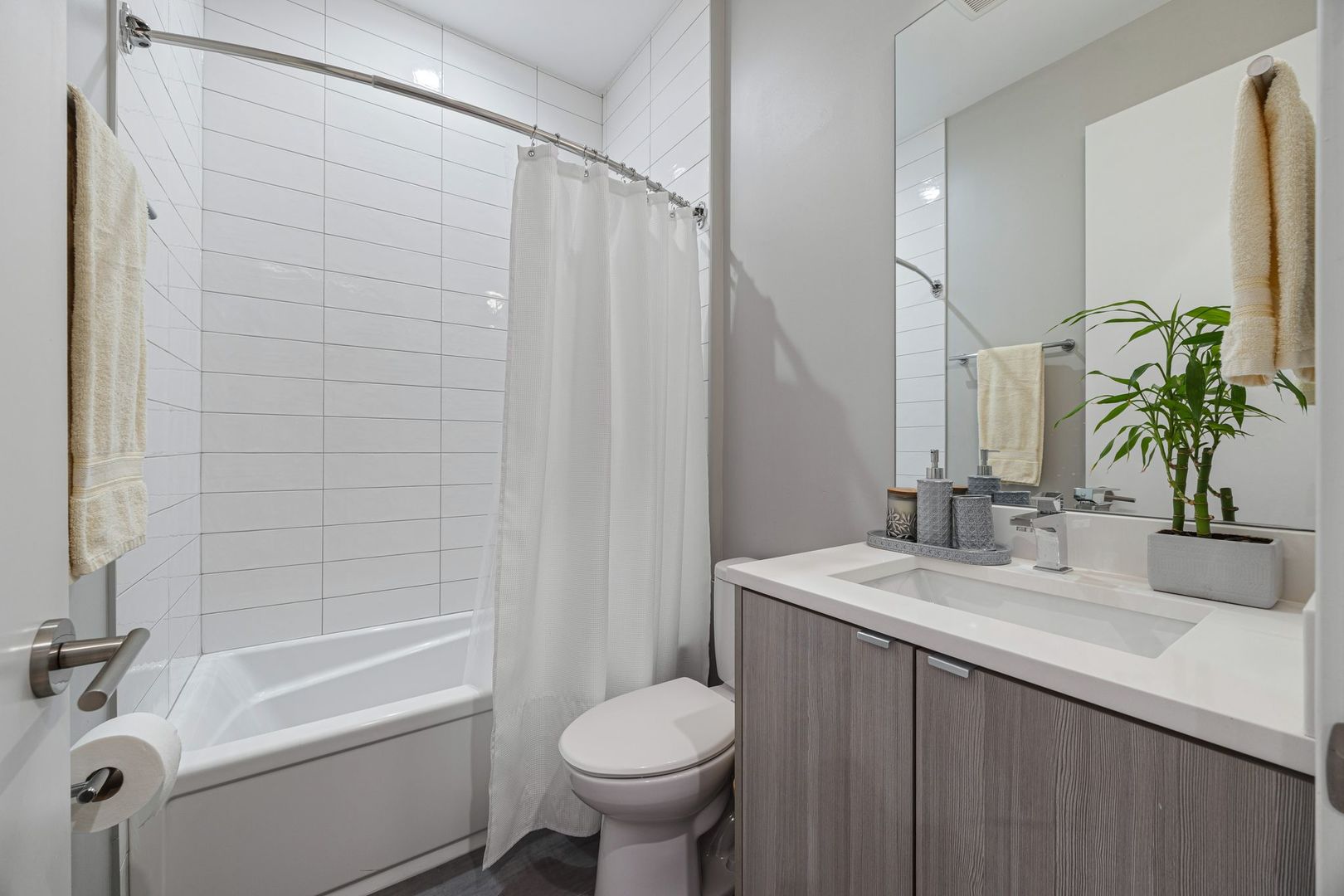 2116 West Chicago Avenue, Unit 3W Chicago, IL 60622 - Photo 31 of 37 a bathroom with a sink toilet and shower
