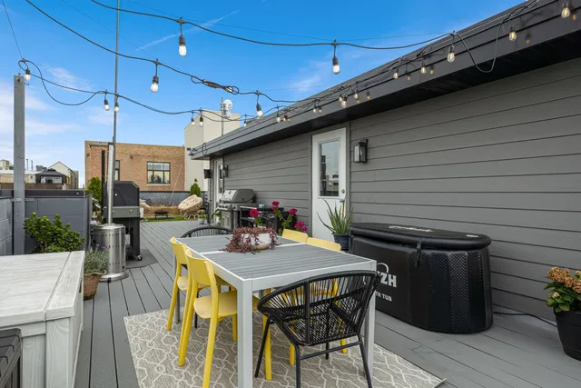 a view of a patio outdoor seating and wooden floor