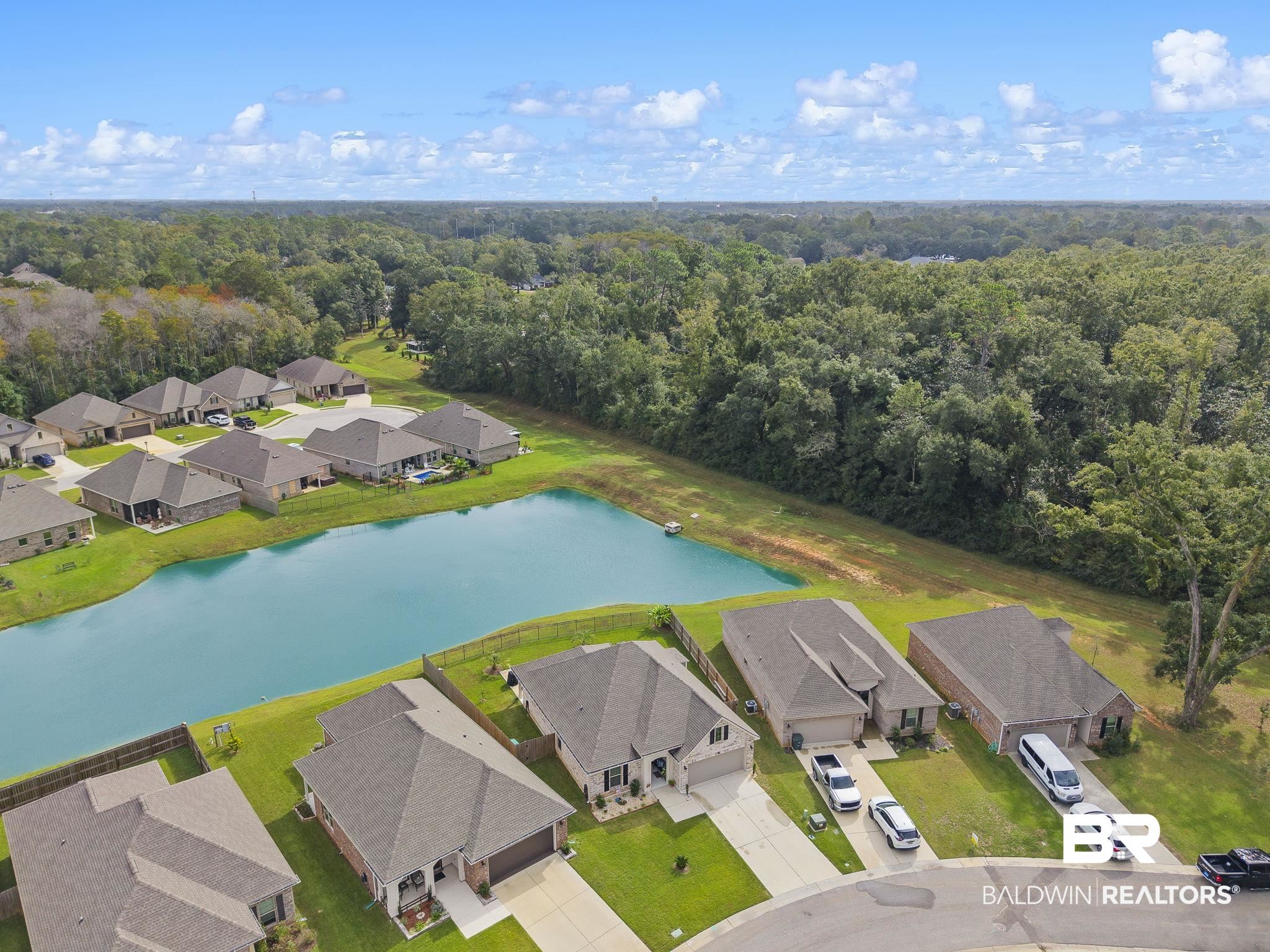 910 Gibson Court Foley, AL 36535 - Photo 46 of 66 Drone / aerial view with a water view