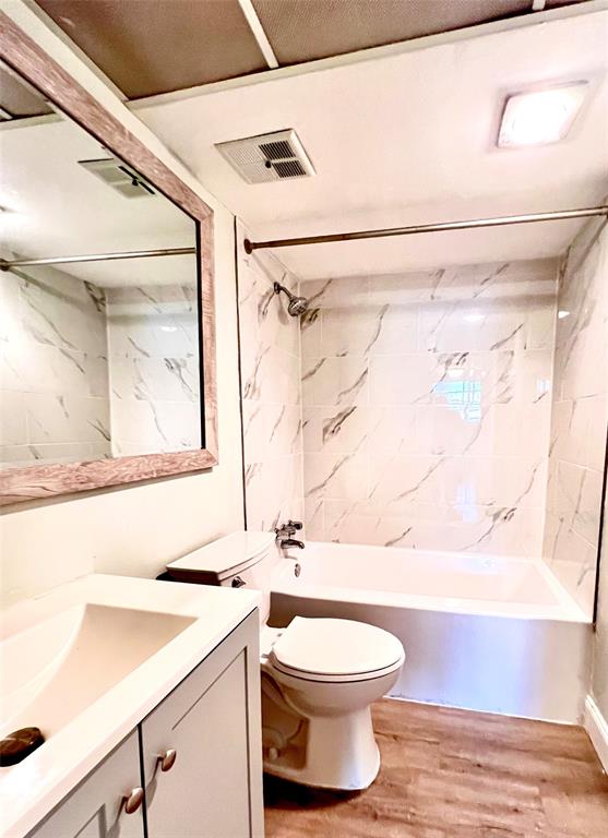 7000 Northwest 17th Street, Unit 109 Plantation, FL 33313 - Photo 5 of 21 a bathroom with a toilet a sink and a shower