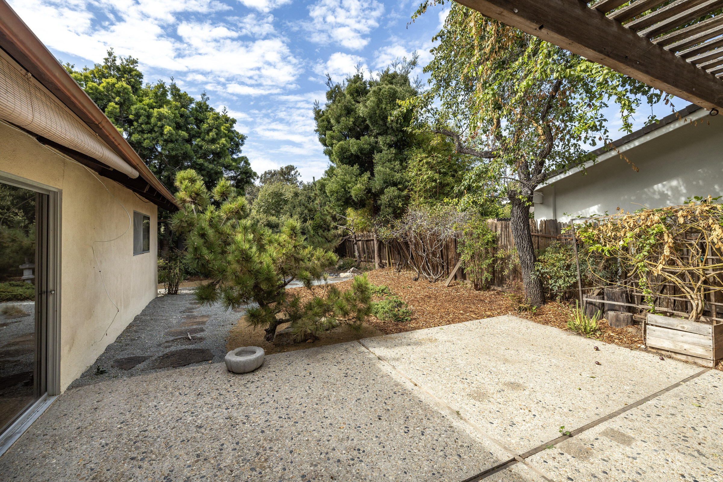 5121 Walnut Park Drive Santa Barbara, CA 93111 - Photo 15 of 23 a view of a backyard of the house