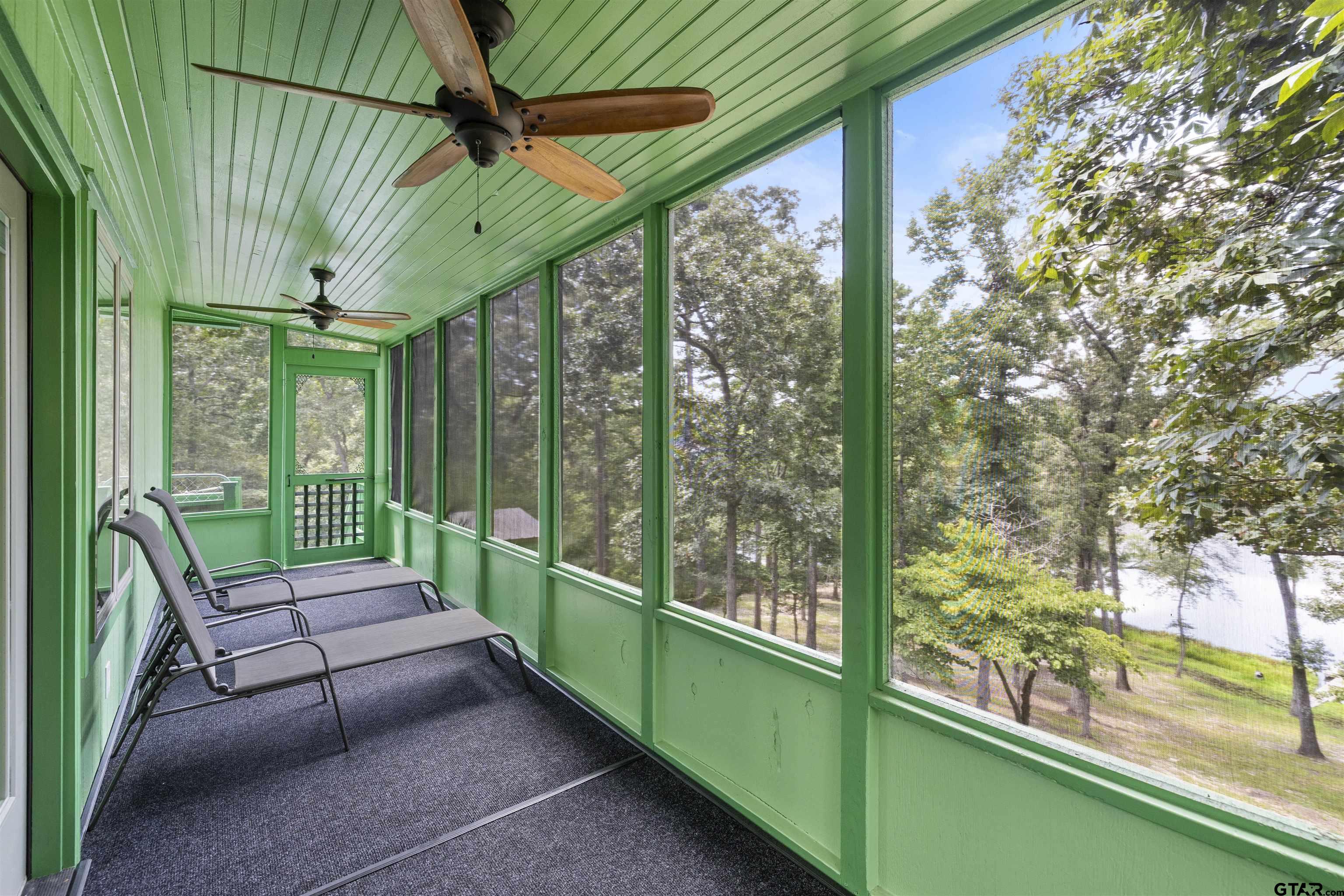 5066 Bob O Link Road Gilmer, TX 75645 - Photo 14 of 34 a backyard of a house with outdoor seating