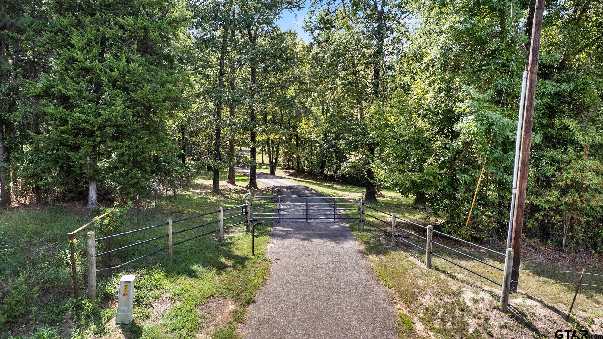 5066 Bob O Link Road Gilmer, TX 75645 - Photo 15 of 34 a view of a pathway with a park