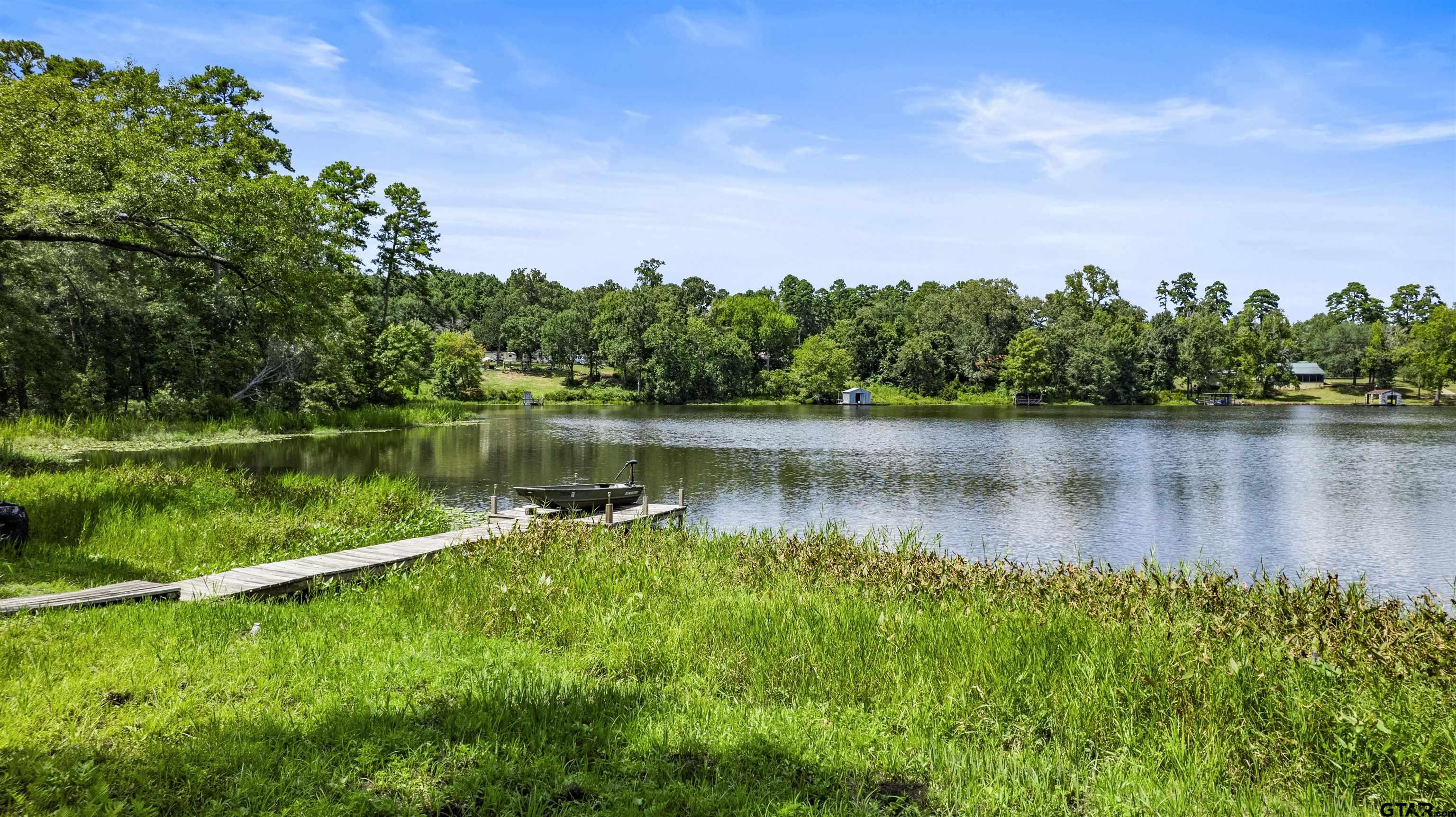 5066 Bob O Link Road Gilmer, TX 75645 - Photo 3 of 34 a view of a lake