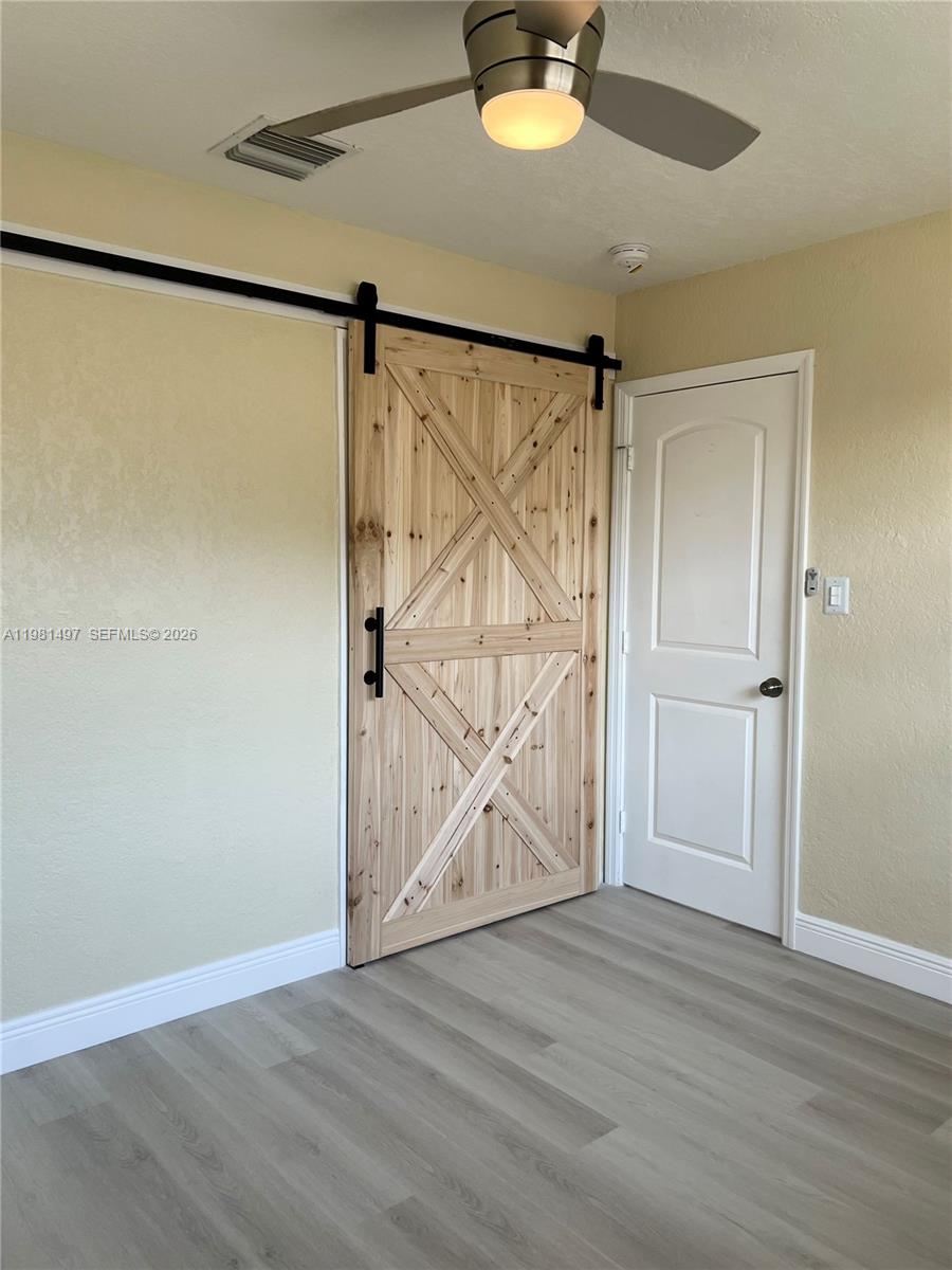 369 Phippen Waiters Road, Unit 2 Dania Beach, FL 33004 - Photo 11 of 18 a view of an empty room