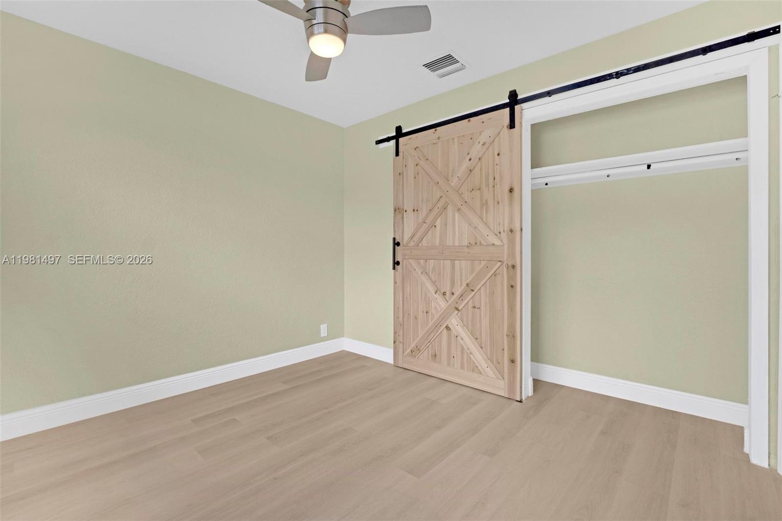 369 Phippen Waiters Road, Unit 2 Dania Beach, FL 33004 - Photo 13 of 18 a view of an empty room