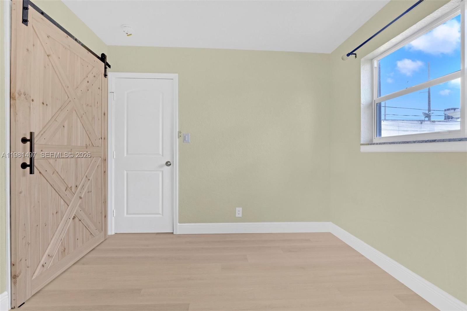 369 Phippen Waiters Road, Unit 2 Dania Beach, FL 33004 - Photo 15 of 18 a view of an empty room