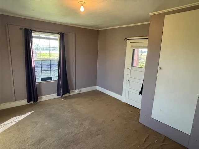 an empty room with windows