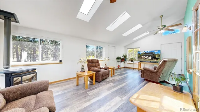 a living room with furniture or outdoor view and a large window