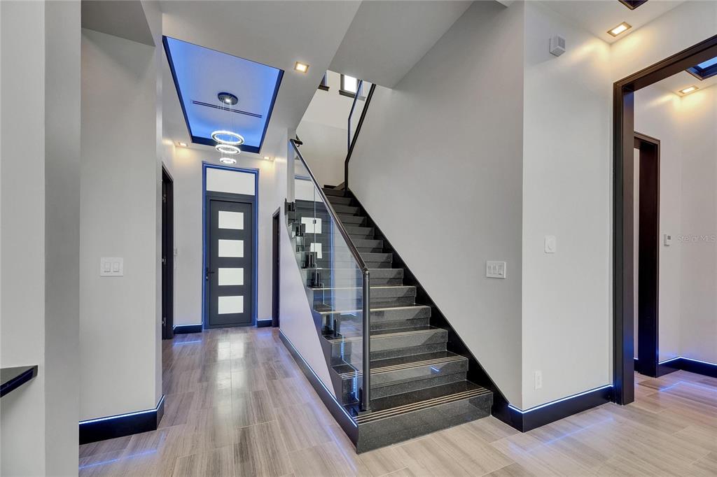 6528 Simone Shores Circle Apollo Beach, FL 33572 - Photo 54 of 98 a view of entryway and hall with wooden floor
