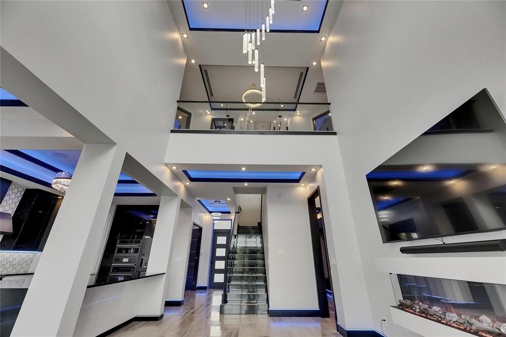6528 Simone Shores Circle Apollo Beach, FL 33572 - Photo 55 of 98 a kitchen with stainless steel appliances granite countertop a stove and a refrigerator