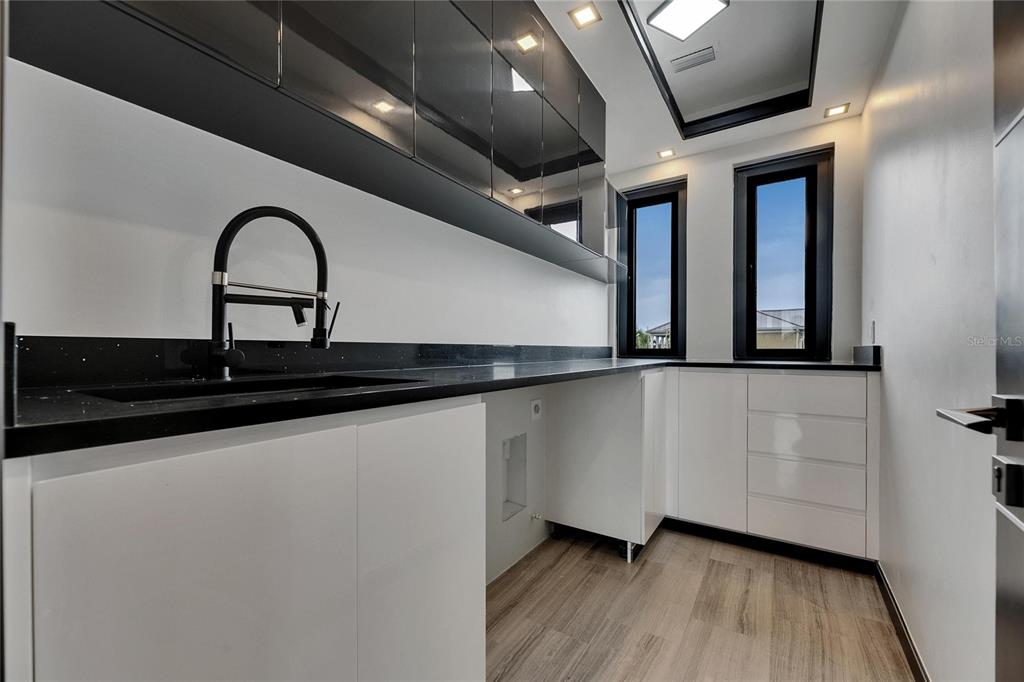 6528 Simone Shores Circle Apollo Beach, FL 33572 - Photo 64 of 98 a close view of a faucet in the kitchen