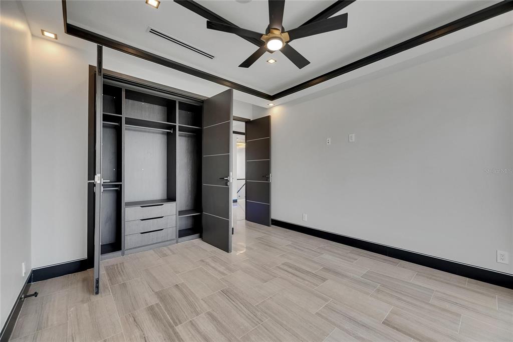 6528 Simone Shores Circle Apollo Beach, FL 33572 - Photo 69 of 98 a view of empty room with wooden floor