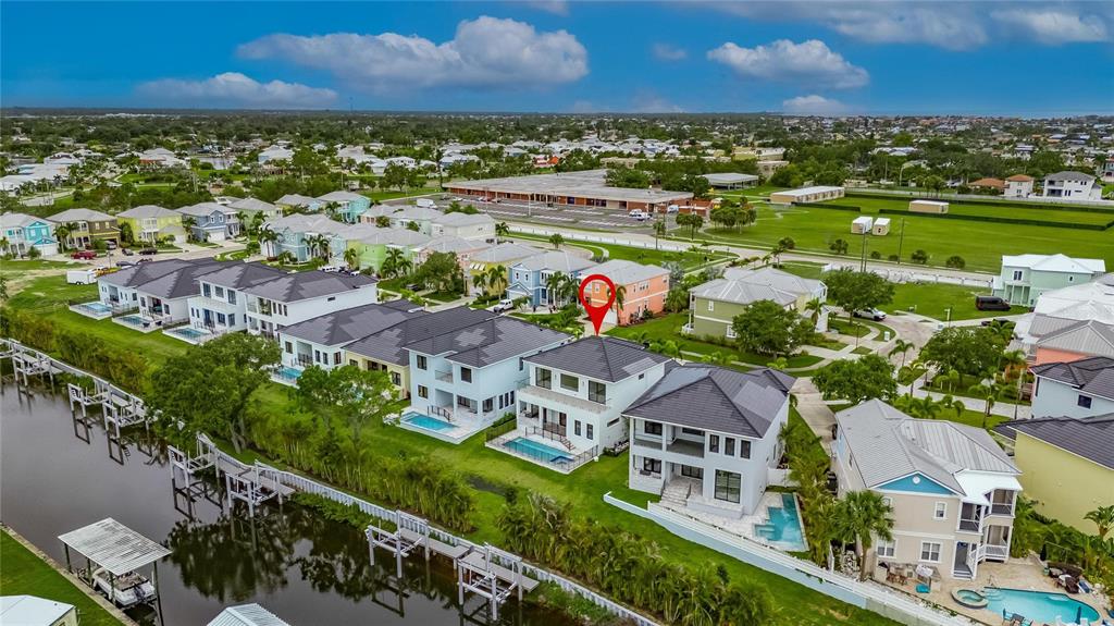 6528 Simone Shores Circle Apollo Beach, FL 33572 - Photo 90 of 98 an aerial view of residential houses with outdoor space and river