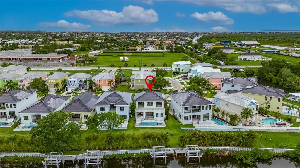 6528 Simone Shores Circle Apollo Beach, FL 33572 - Photo 91 of 98 a view of residential houses with outdoor space and a lake view