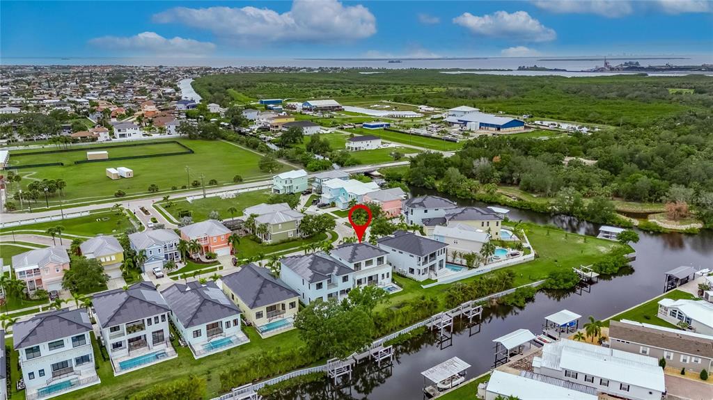 6528 Simone Shores Circle Apollo Beach, FL 33572 - Photo 94 of 98 an aerial view of residential houses with outdoor space and street view