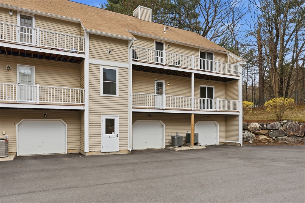 425 Main Street, Unit 22C Hudson, MA 01749 - Photo 21 of 23 a front view of a house