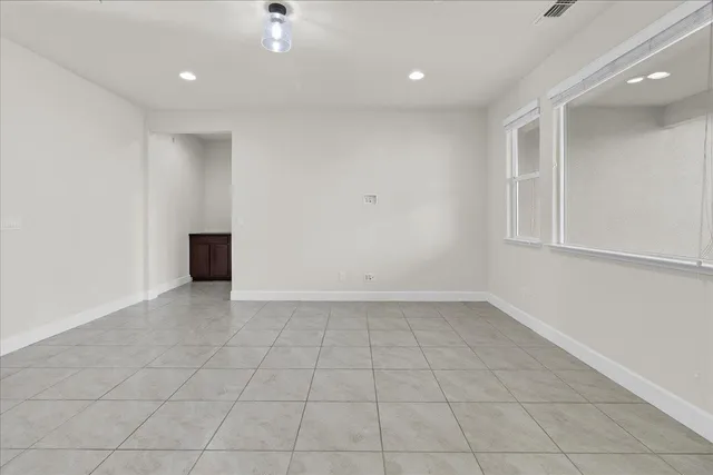 a view of kitchen with stainless steel appliances cabinets and a sink
