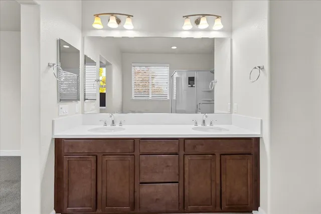 a white bath tub sitting next to a window