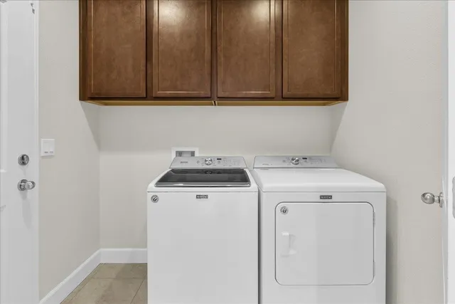 swimming pool view with a garden