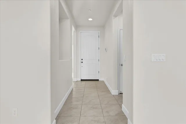 a view of a hallway with a shower