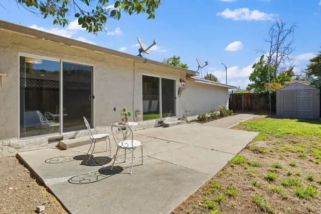 a front view of a house with patio