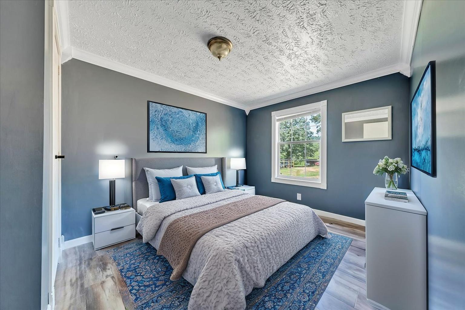 6638 Stewartsville Road Moneta, VA 24121 - Photo 12 of 27 a bedroom with double bed and a window