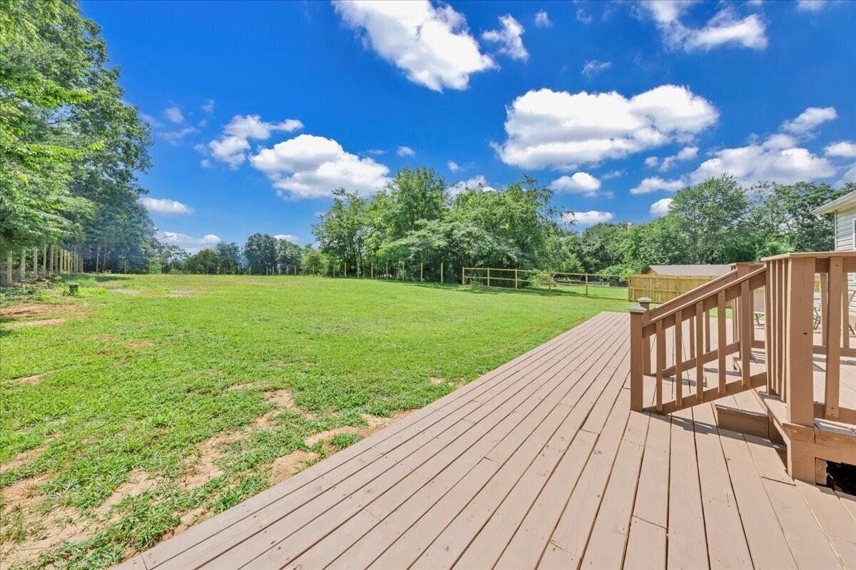 6638 Stewartsville Road Moneta, VA 24121 - Photo 23 of 27 a view of a house with a yard