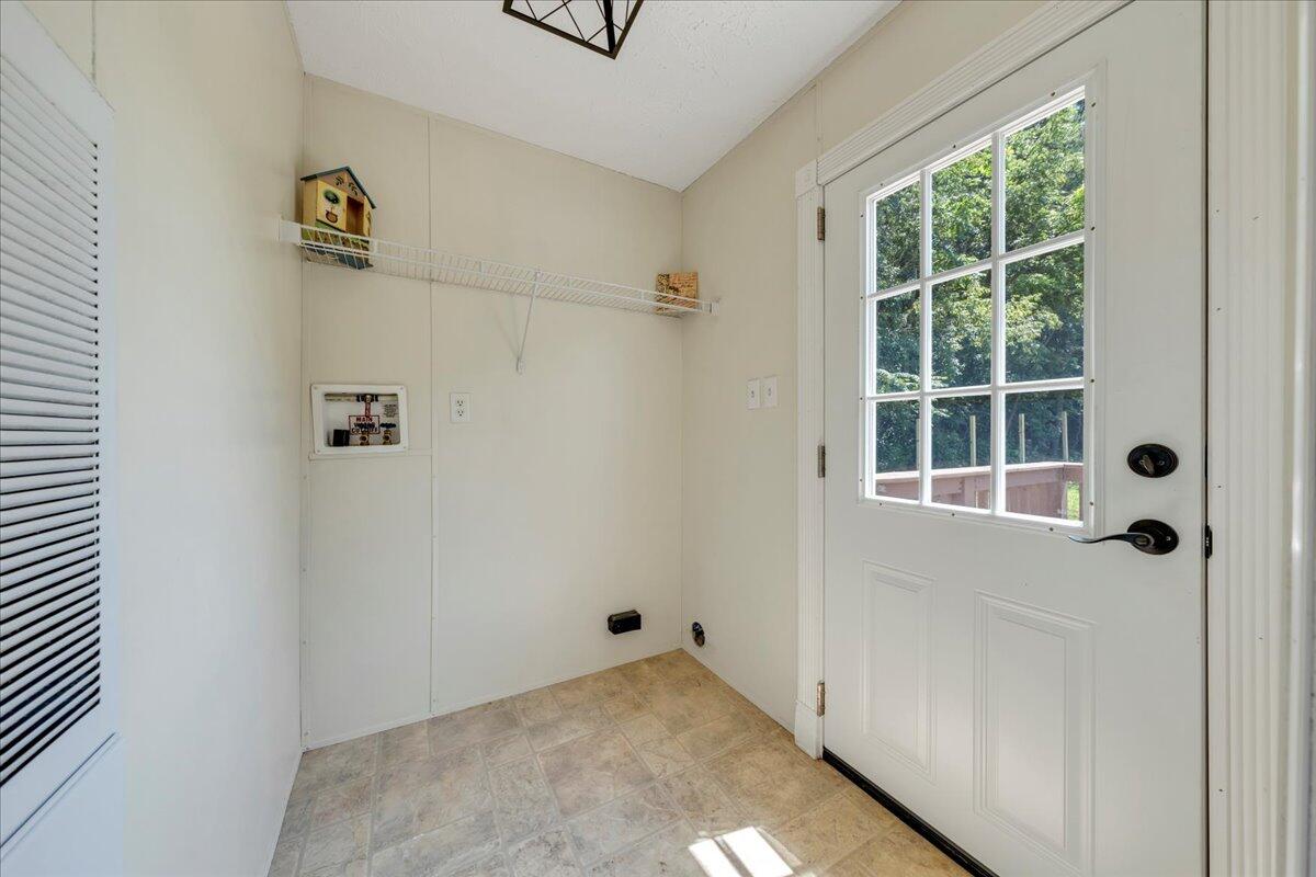 6638 Stewartsville Road Moneta, VA 24121 - Photo 8 of 27 a view of empty room with windows