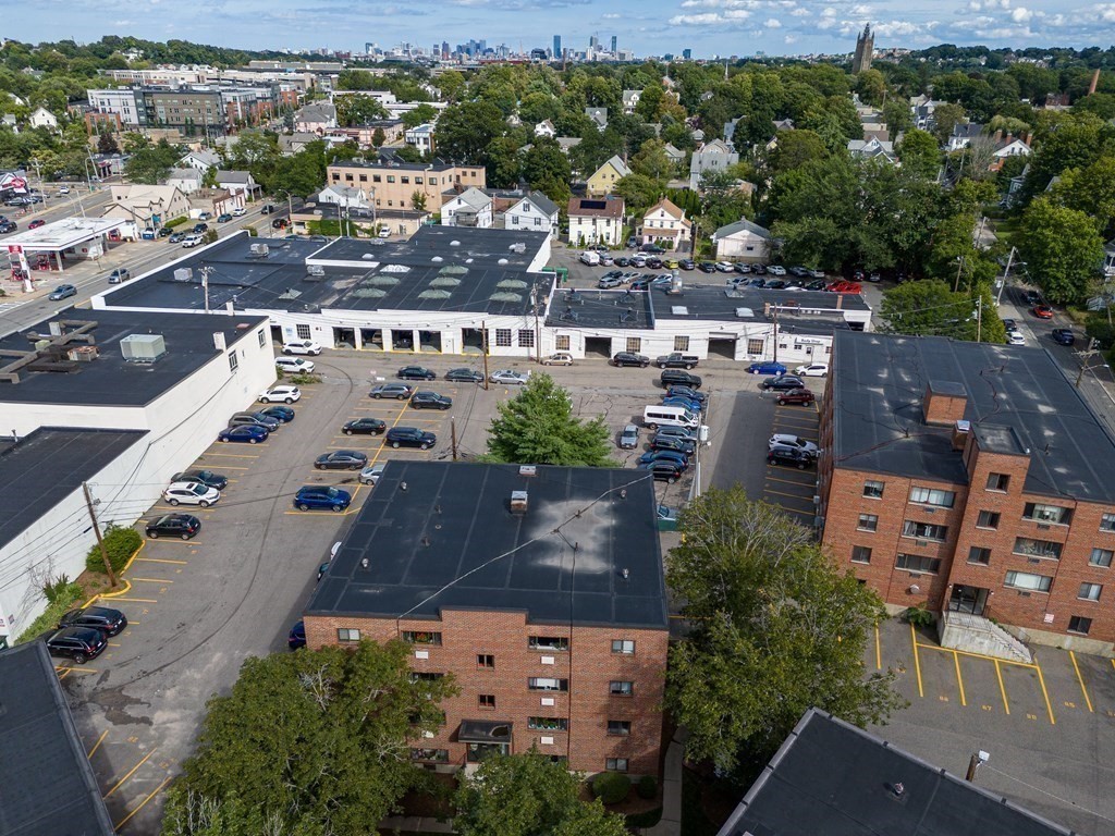 14 Riverside Street, Unit G3 Watertown, MA 02472 - Photo 15 of 18 an aerial view of multiple houses with yard