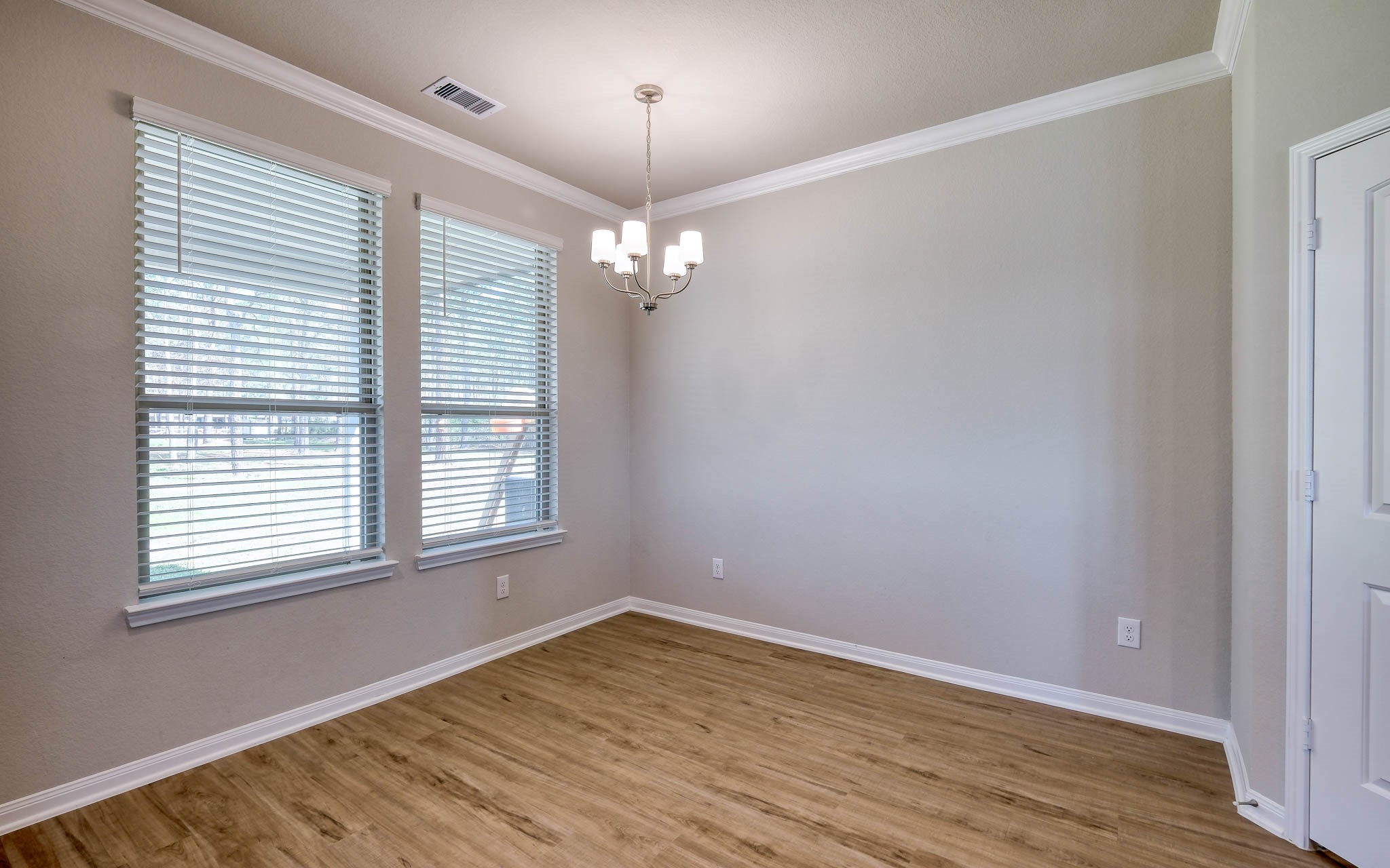 16747 Rockwall Street Conroe, TX 77303 - Photo 20 of 50 Eat-in-Dining space is ready for your special touch! Front to back, this .99 acre has so many possibilities and awaits your imagination. 16747 Rockwall St, 77303 features .9 partially cleared acre, stone and brick home built in 2023. Well cared for, and ready to grow your dreams!