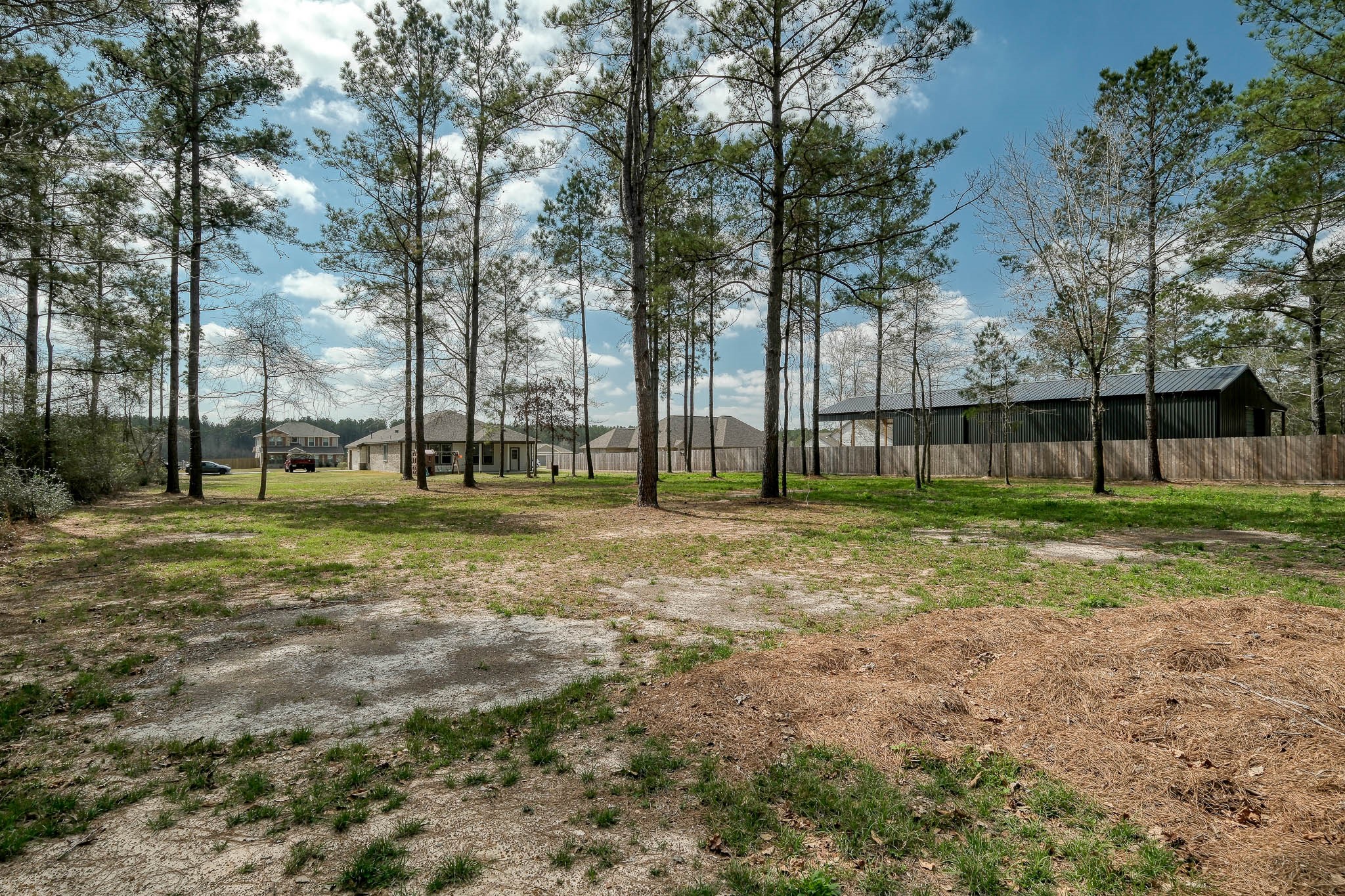 16747 Rockwall Street Conroe, TX 77303 - Photo 41 of 50 View from back of property. These acre size lots in this section allow privacy for homeowners, with space for outbuildings your new lifestyle needs!