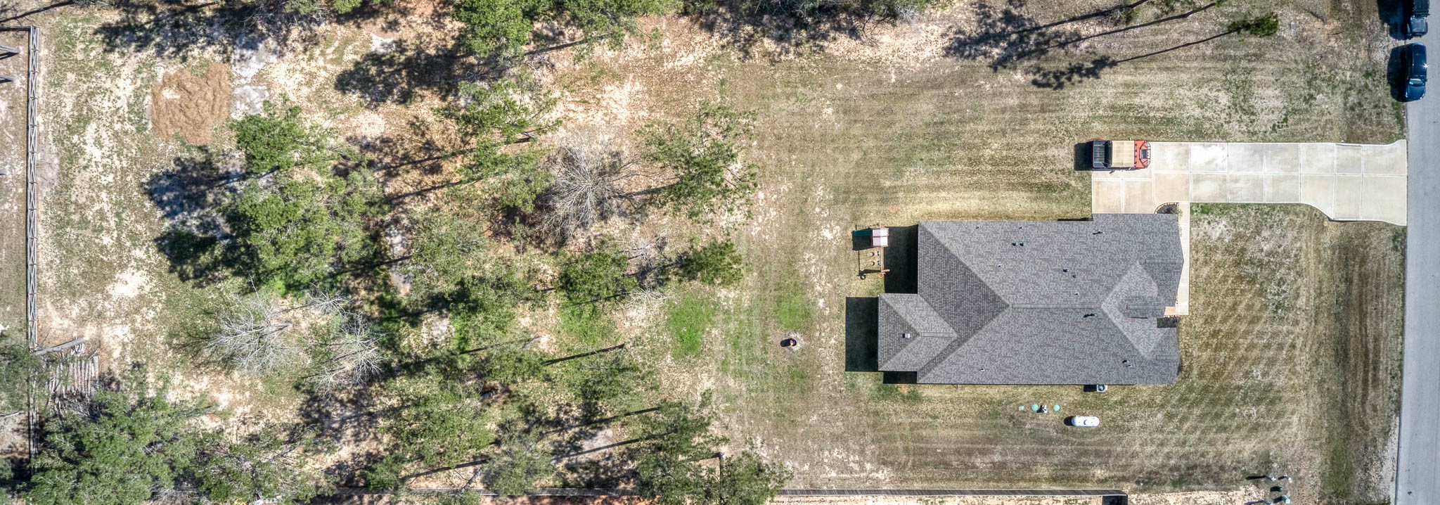 16747 Rockwall Street Conroe, TX 77303 - Photo 47 of 50 an aerial view of houses with outdoor space