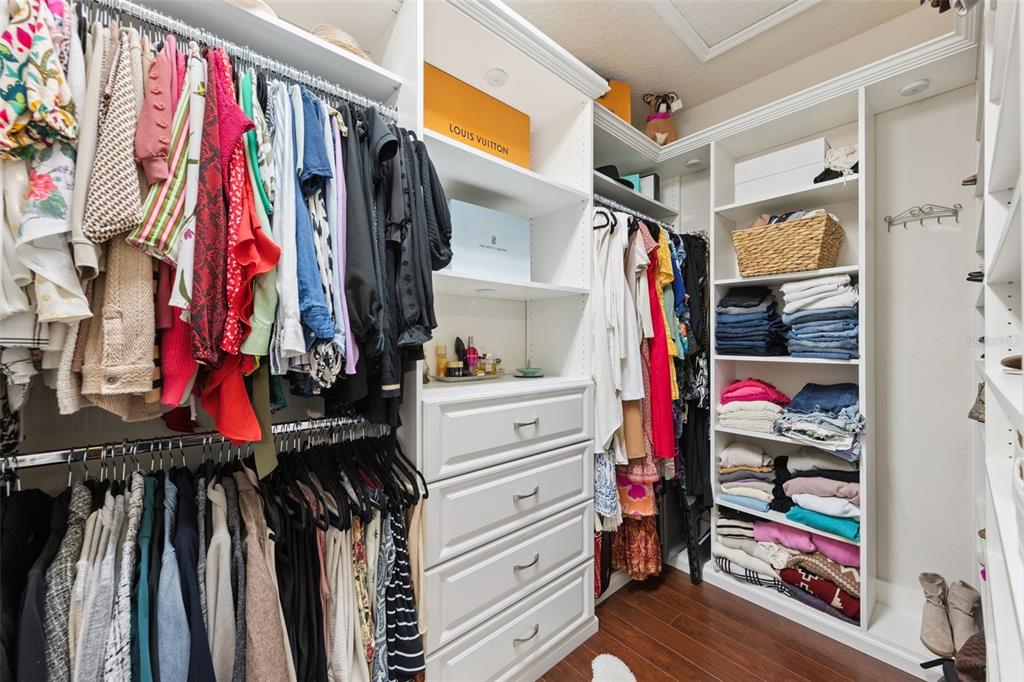 607 Pensacola Lane Lake Mary, FL 32746 - Photo 12 of 35 a view of walk in closet with clothes and shoes