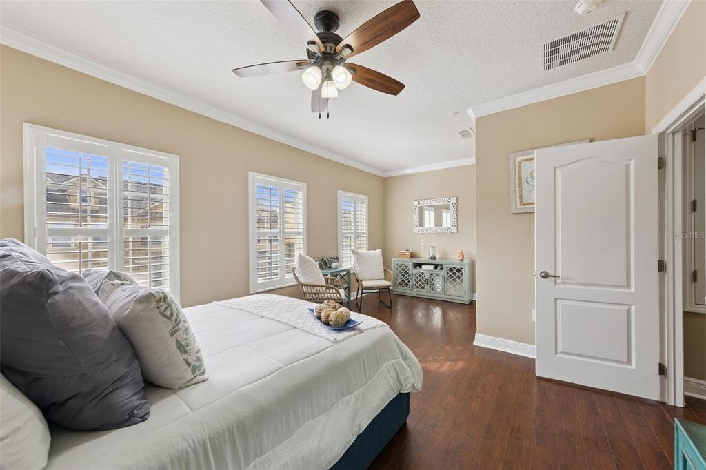 607 Pensacola Lane Lake Mary, FL 32746 - Photo 17 of 35 a bed room with a bed and a chandelier