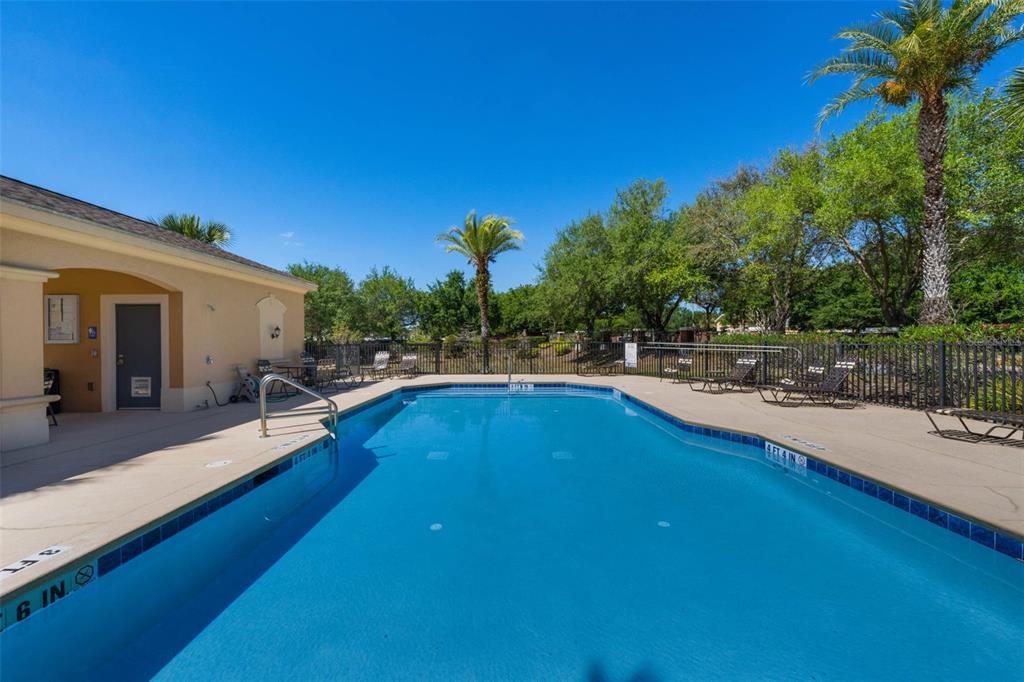607 Pensacola Lane Lake Mary, FL 32746 - Photo 31 of 35 a view of a swimming pool with lounge chair