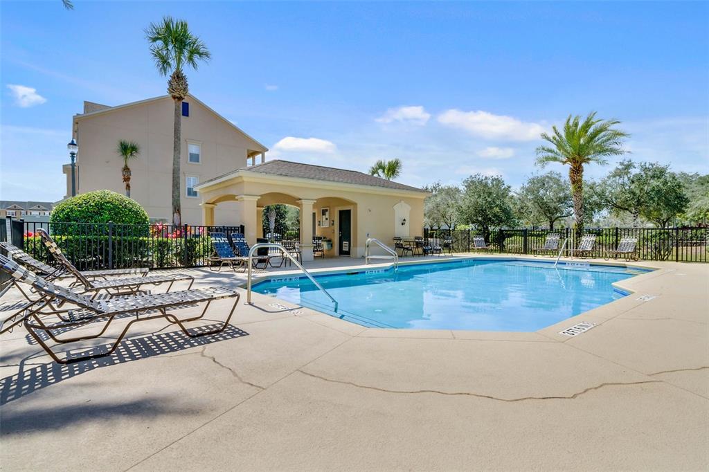 607 Pensacola Lane Lake Mary, FL 32746 - Photo 35 of 35 a view of a swimming pool with outdoor seating